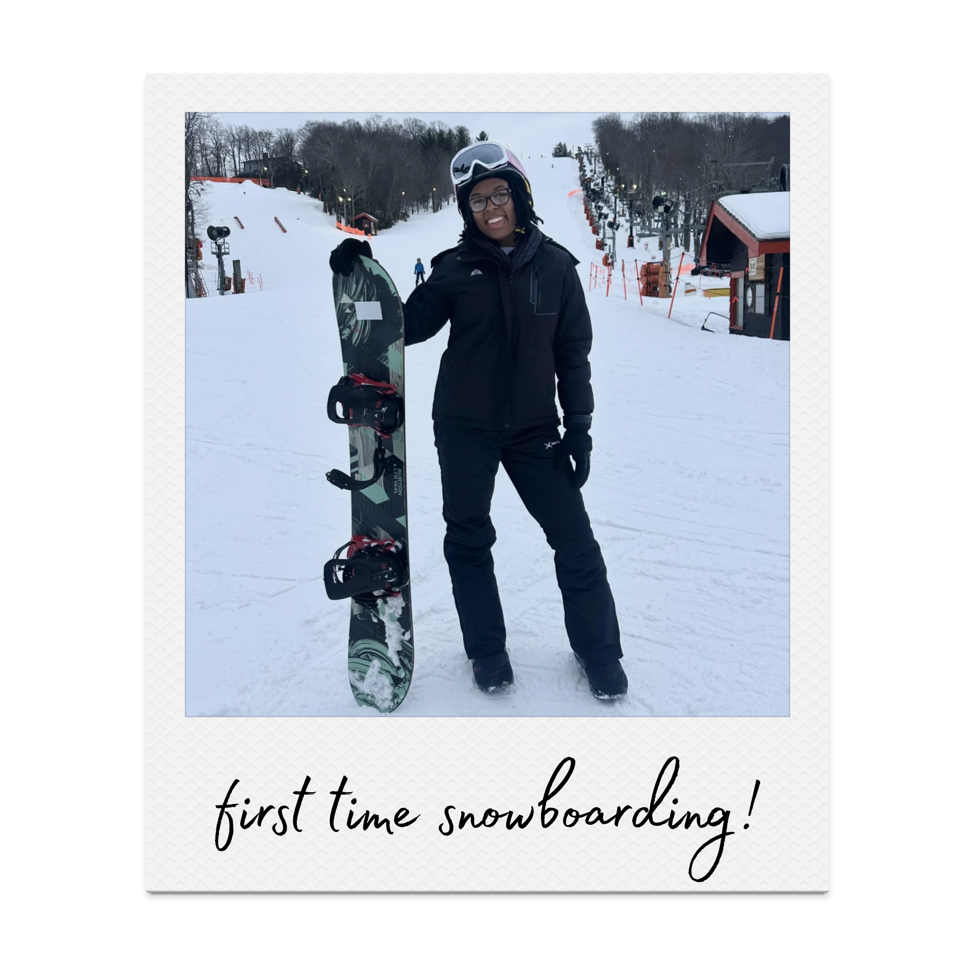 polaroid picture of ashley posing with snowboard with caption that reads 'first time snowboarding!'